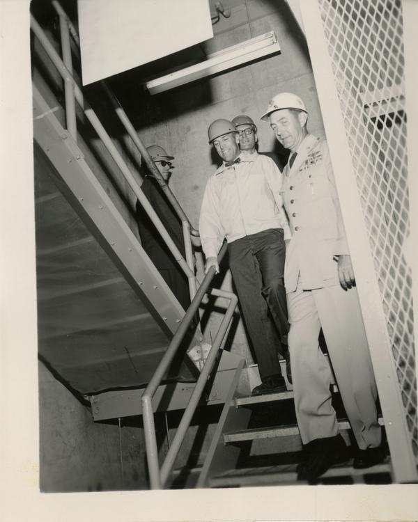 Members of the Defense Science Seminar walking down the stairs, ca. 1965