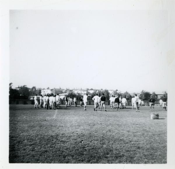 UCLA football team on field during practice, ca 1940s - 1950s