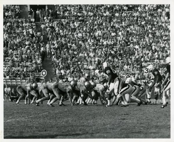 Football game action during UCLA v. Stanford game, ca. 1960s