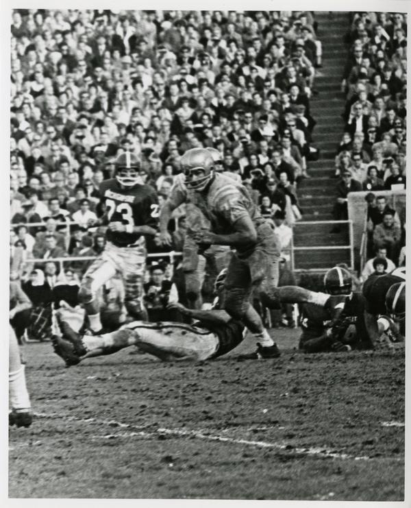 Football game action during UCLA v. Michigan State game at the Rose Bowl, January 1966