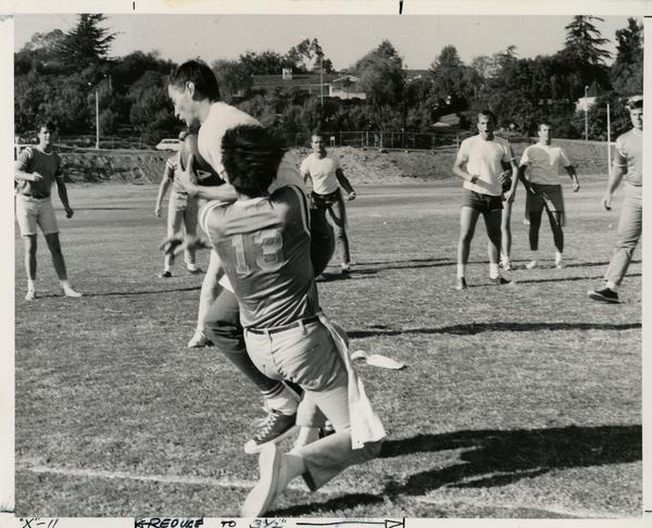 UCLA intramural football players in practice