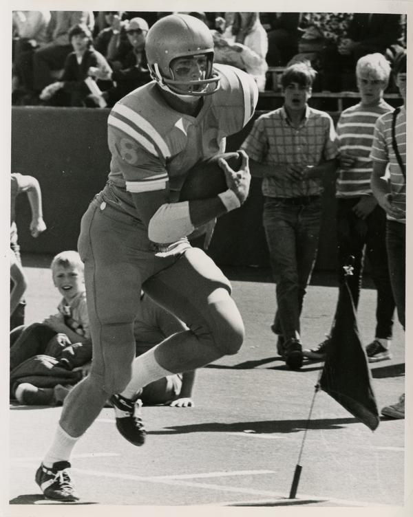 UCLA tight end Bob Christianson crossing the goal line in the football game against Oregon State University