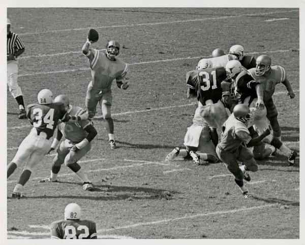 UCLA quarterback Mike Flores throwing the ball in a game, September 18, 1971