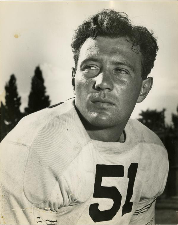 UCLA football player James Millette on the field, 1947