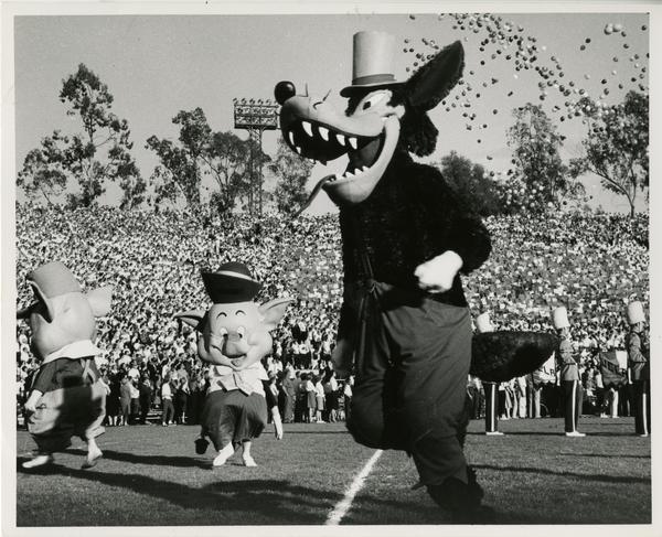 Mascots dancing at the Rose Bowl during a UCLA football game