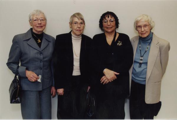 Women gathered with Frances Clarke Sayres during her lecture
