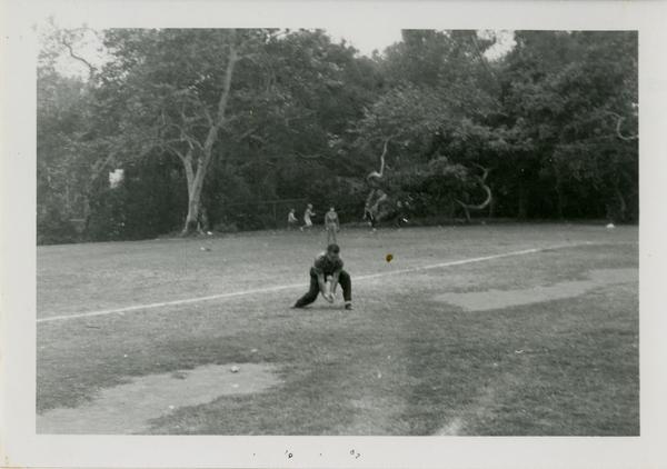Student catching a ballat a geography department picnic
