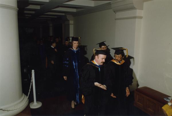 Graduates lining up for the PhD Hooding Ceremony, June 1988