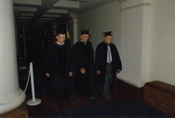 Faculty lining up for the PhD Hooding Ceremony