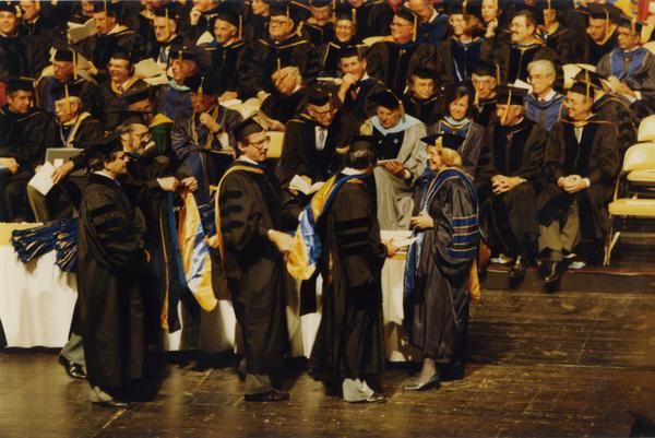 Faculty hooding a PhD candidate, June 1988