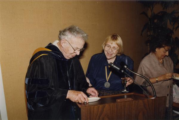 Raymond Fisher and Victoria Fromkin at podium during Robing Reception, June 1988