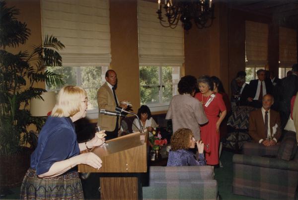 Victoria Fromkin speaks at podium, June 1988