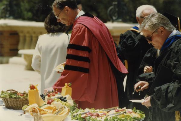 Henry Kelly at buffet table during Robing Reception, June 1988