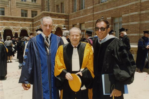 Elwin Svenson, Wolf Leslau and Marvin Alkin stand outside Royce Hall during Robing Reception, June 1988