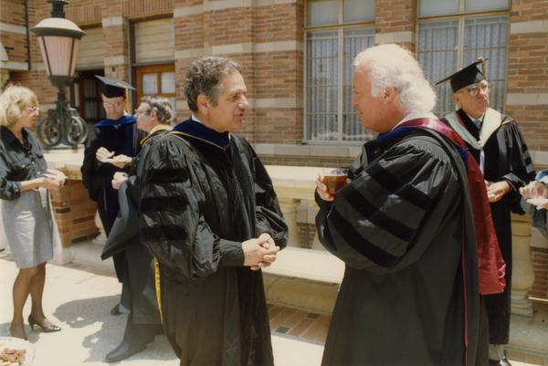 Raymond Orbach and Lewis Nosanow speak outside of Royce Hall during Robing Reception, June 1988
