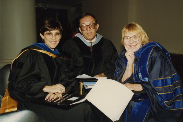 Andrea Rich, Marvin Alkin and Victoria Fromkin sit together before the PhD Hooding Ceremony, June 1988