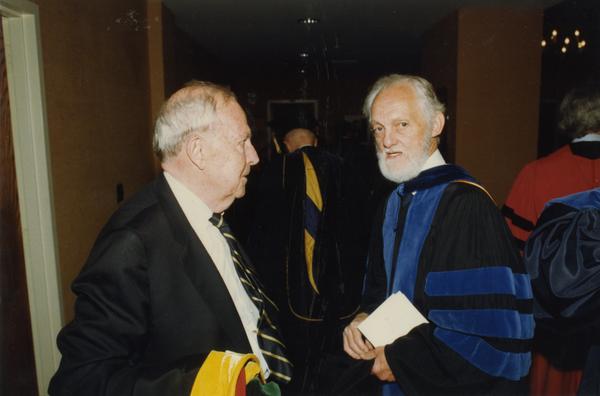 Franklin Murphy and Paul Farrington talk before PhD Hooding Ceremony, June 1988
