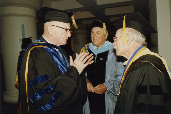 Kenneth Bailey, Norman Miller and Robert Vosper chat before the PhD Hooding Ceremony, June 1988
