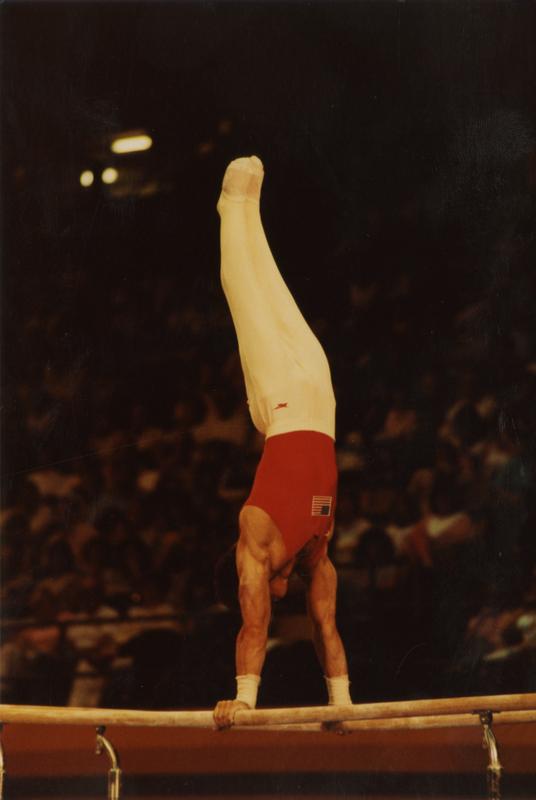 UCLA Gymnast Tim Daggett on parallel bars