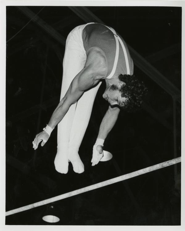 UCLA gymnast Jerry Montooth on high bar
