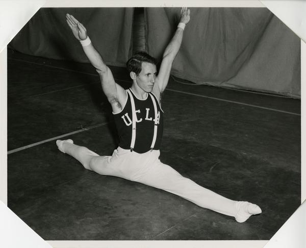 UCLA gymnast performing splits