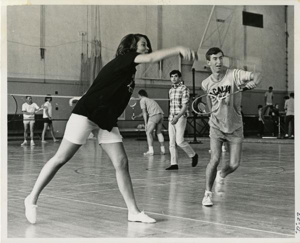 Students playing badminton, ca. 1965