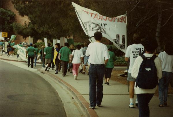 Participants march along street during Labor Union Rally, 1993