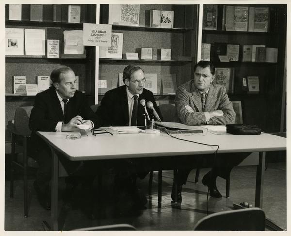 F.D. Murphy, R. Vosper, and C.E. Young speaking at three millionth book accession press conference