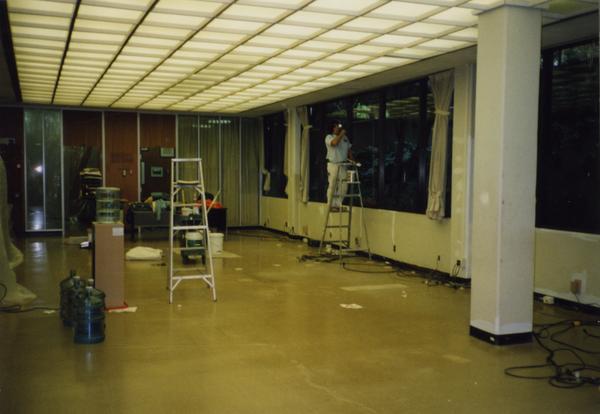 Worker on ladder during Library Special Collections renovation