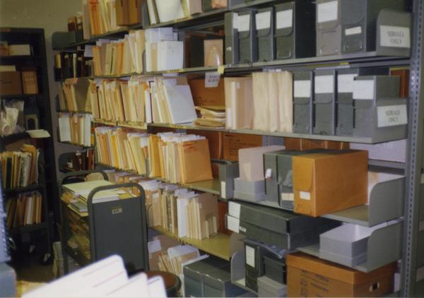 Shelves housing archival materials in Library Special Collections staff area, ca. 1997