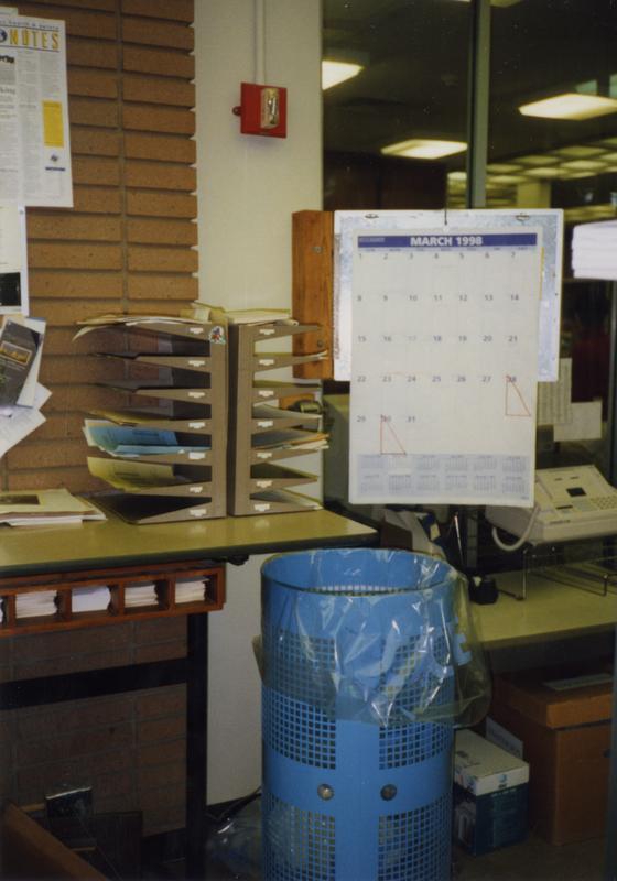 View of calendar and mailboxes in Library Special Collections staff area, ca. March 1998