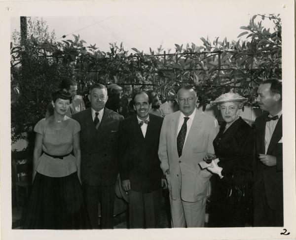 Group portrait of Mary Horn, Regent E. Dickson, Lawrence Clark Powell, Will Robinson, and Mrs Dickson