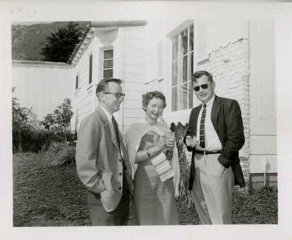 Everett Moore, Mrs. Jenkin, and Thomas Jenkin at party