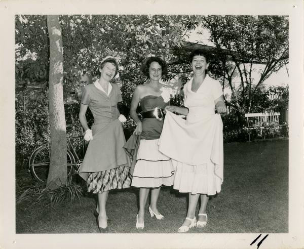 Mary Horn, Fay Powell, and Lorraine Vosper pose at Library staff party
