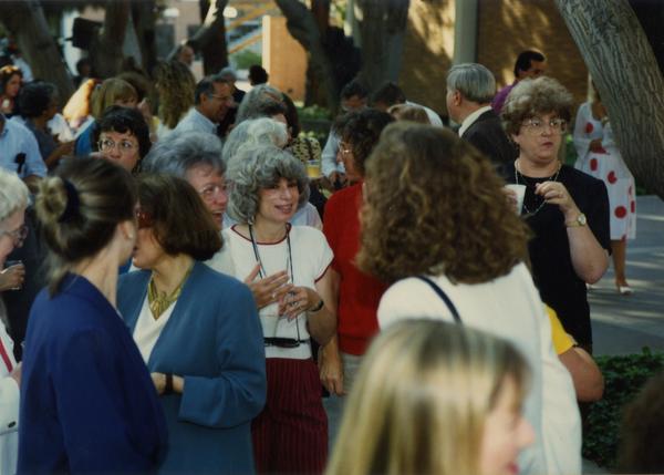 Crowds at a library staff party, ca. 1991