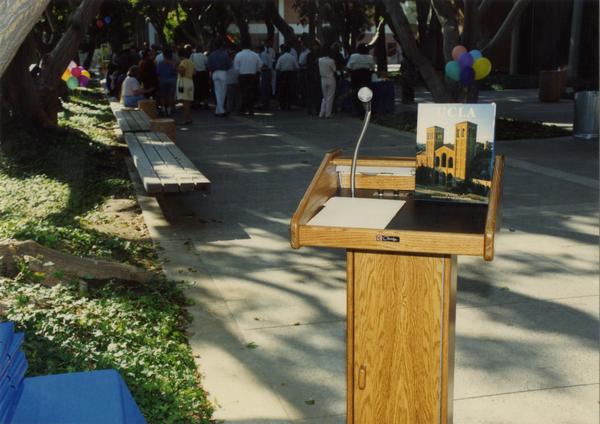 Podium at a library staff party event, ca. 1991