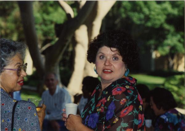 Two library staff members at a staff event, ca. 1991