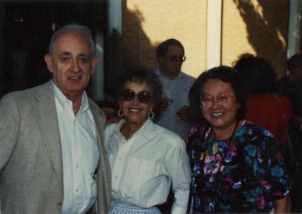 Library staff pose for a photograph at a staff retirement party, 1991