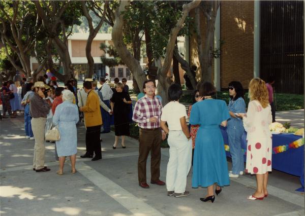 Crowds at a library staff retirement party, 1991