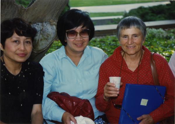 Library staff pose for a photograph at the staff retirement party, 1991