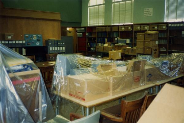 Unpackaged funiture in room 390 in Powell Library, ca. 1990's