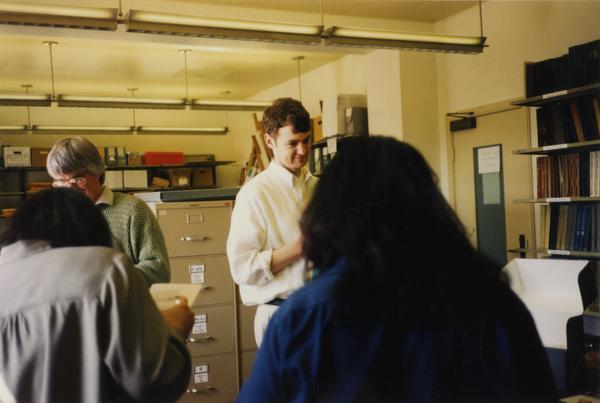 People examine archival material during the University Archives open house, May 23, 1997