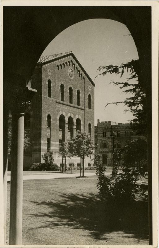 View of Kinsey Hall through arcade of Royce Hall, ca. 1942