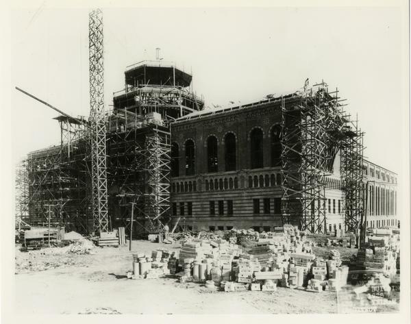 North façade of Powell Library during construction, ca. 1928