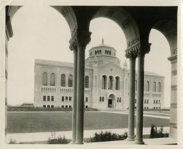 View of Powell Library through Royce Hall arches