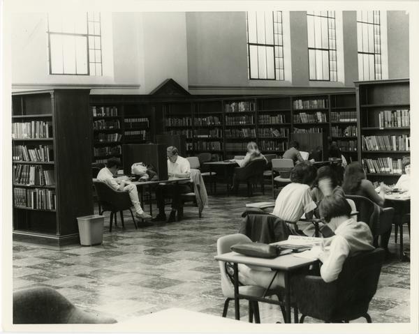 Students studying in Main Reading Room of Powell Library