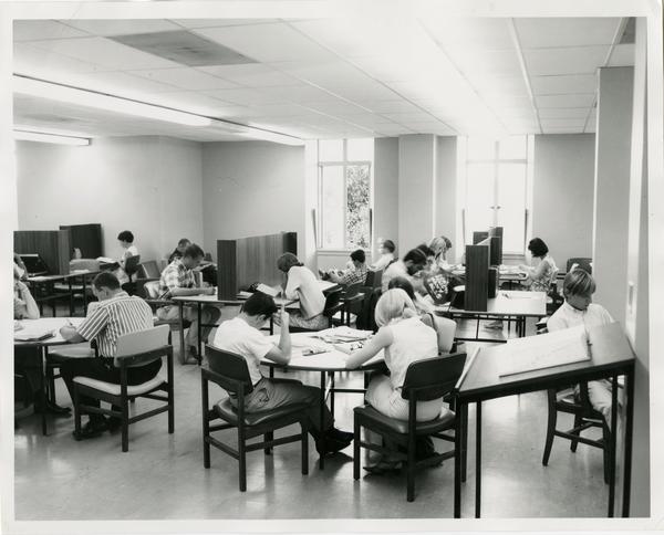 Students studying in Powell Library, ca. 1966