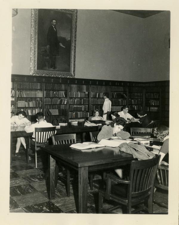 Students studying in reading room of Powell Library
