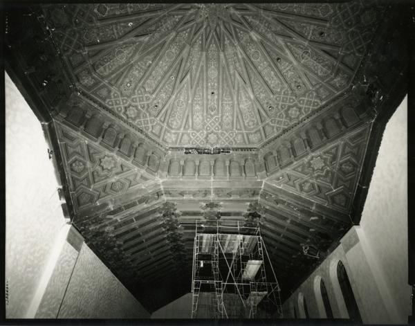 Renovation of ceiling artwork during Powell Library