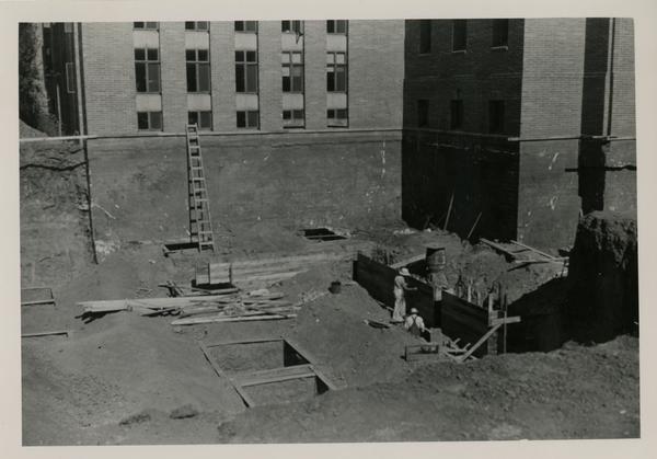 Workers building the Powell Library Stack Extension